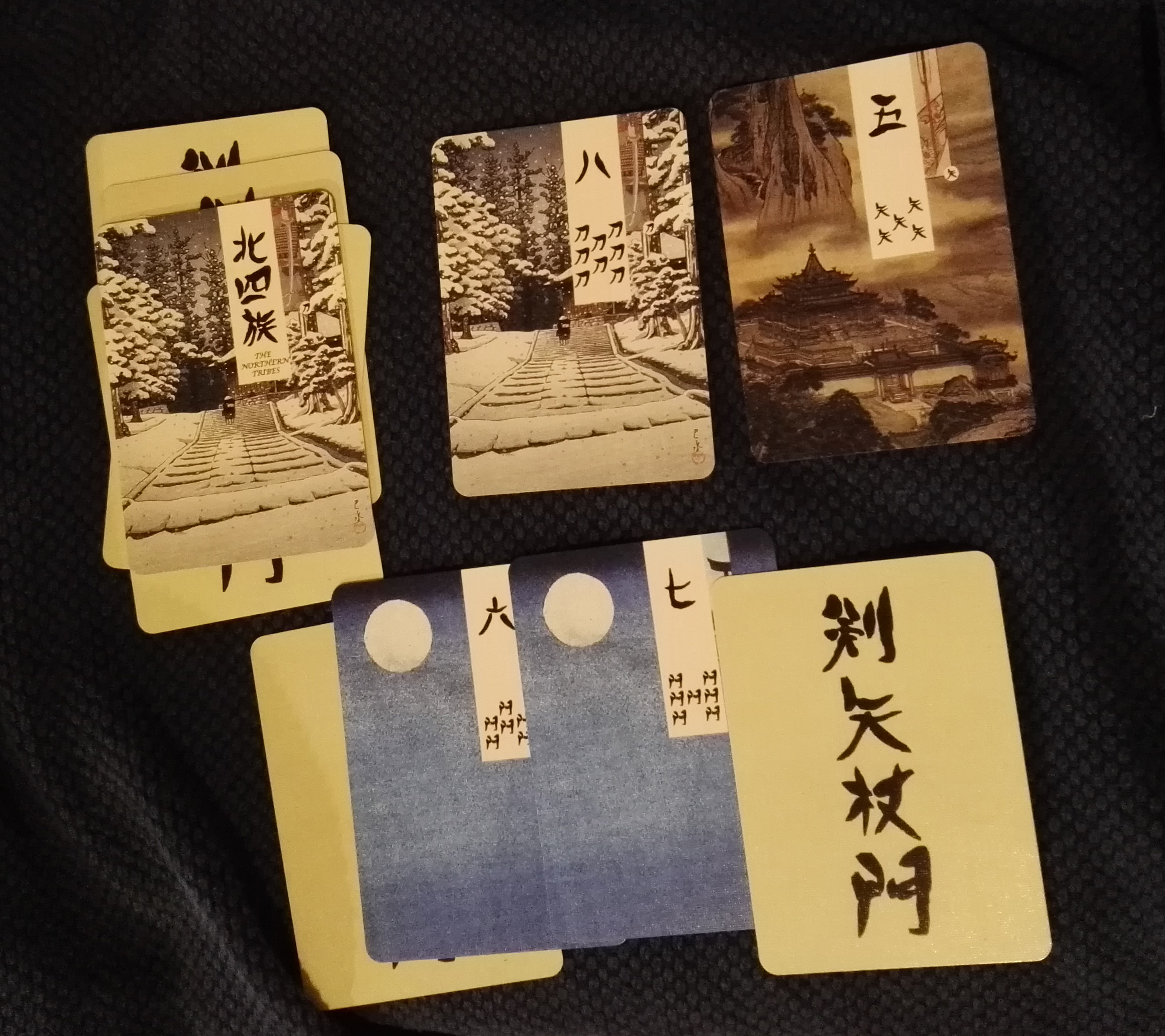 One Side of a Commanding Conquerors Game Field with a Classic, Ukiyo-e Style Age of Heroes Deck